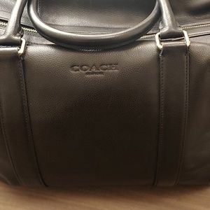 Black leather Coach duffle bag